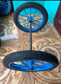 Foto 2 Roda gerobak ring 17 sepasang roda + besi as