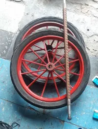 Foto 4 Roda gerobak ring 17 sepasang roda + besi as
