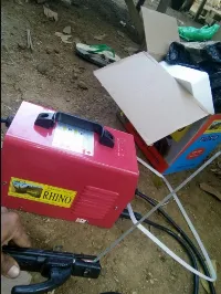 Foto 3 Mesin Travo Las listrik inverter Rhino 120A merah 900 watt