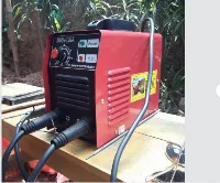 Foto 1 Mesin Travo Las listrik inverter Rhino 120A merah 900 watt